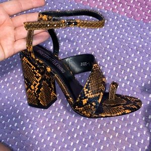 Snake Asymmetric Strap Toe Loop Block Heel Sandal